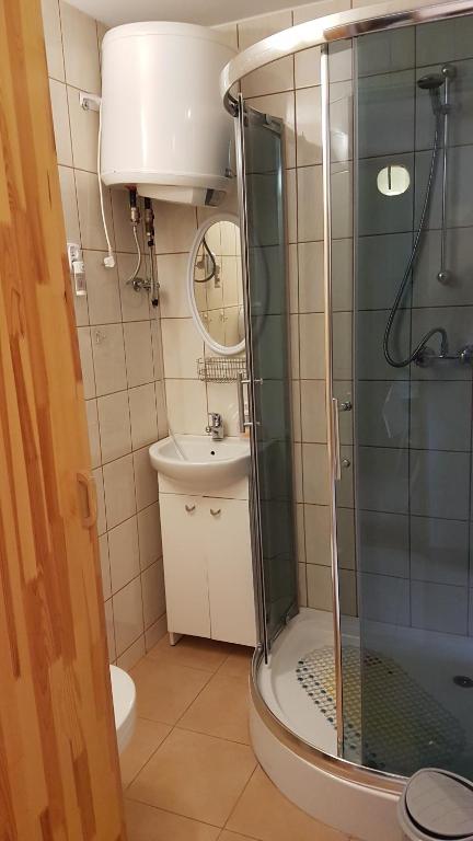 Kúpeľňa v ubytovaní Gospodarstwo Agroturystyczne Dolina Zachwytu