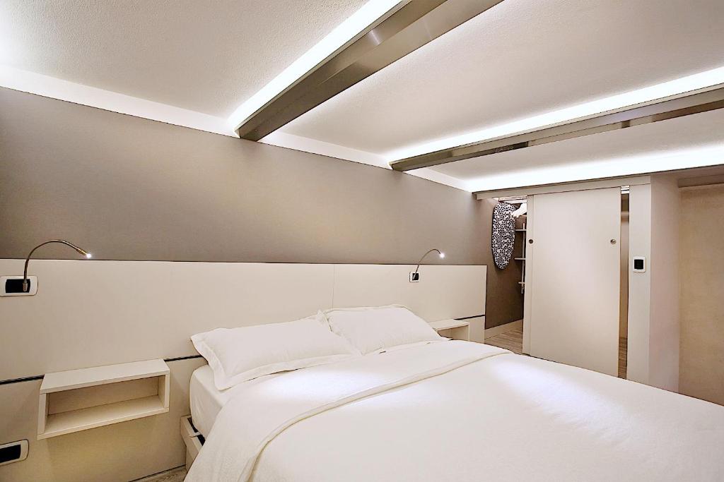 Posteľ alebo postele v izbe v ubytovaní Le Cadreghe Apartments