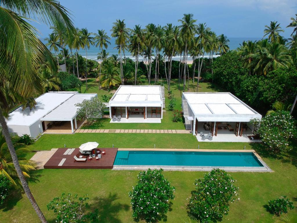 an aerial view of a house with a swimming pool at Bentota No 1 in Bentota