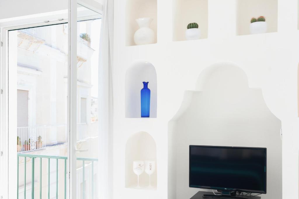 TV a/nebo společenská místnost v ubytování Boutique Suites in Piazzetta