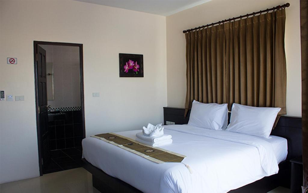 Postel nebo postele na pokoji v ubytování 88 Hotel