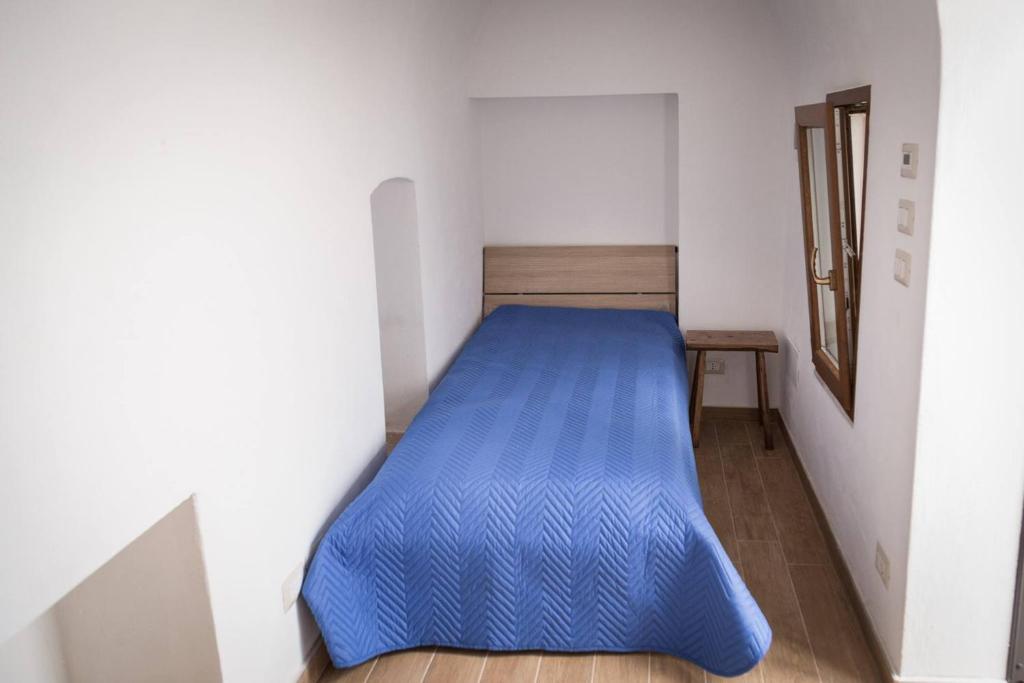 A bed or beds in a room at Vico Marina