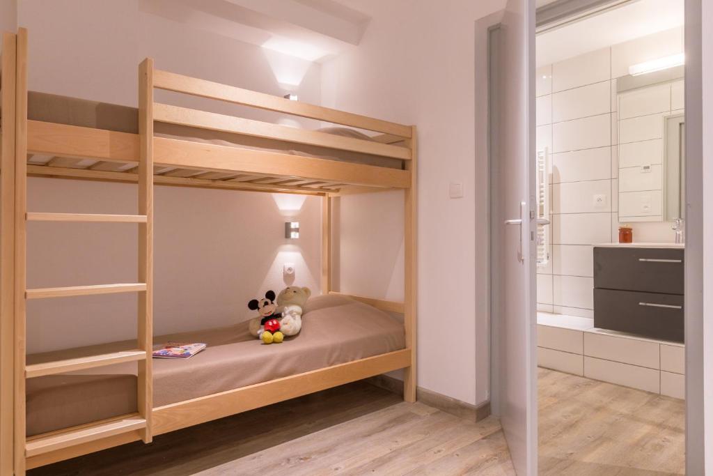 Postel nebo postele na pokoji v ubytování Le Signal du Prorel