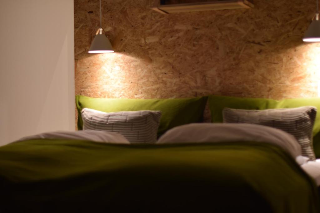 Postel nebo postele na pokoji v ubytování Vilcon Hotel & Konferencegaard