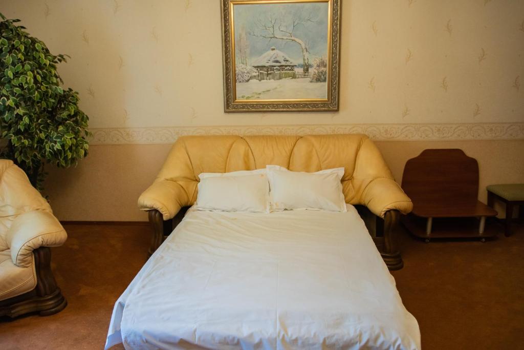 Postel nebo postele na pokoji v ubytování Kamelot
