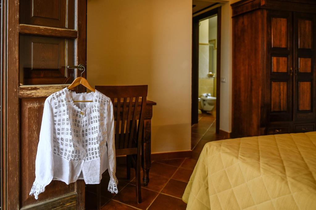 Postel nebo postele na pokoji v ubytování Hotel Funtana Ena