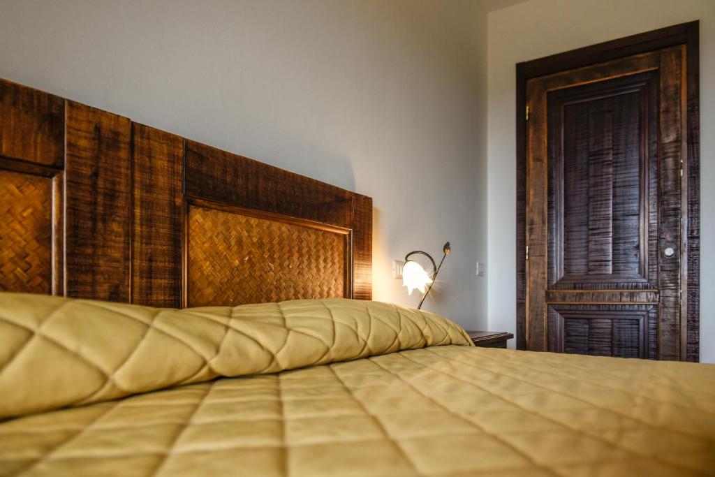 Postel nebo postele na pokoji v ubytování Hotel Funtana Ena