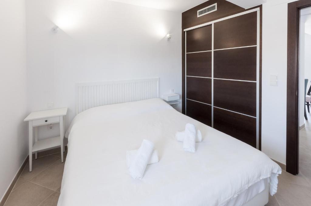 Posteľ alebo postele v izbe v ubytovaní Sea Pearl