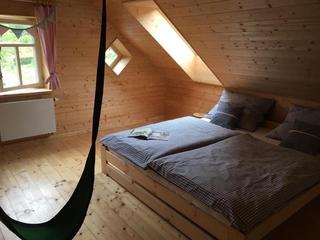 Postel nebo postele na pokoji v ubytování Chalupa Rozmarýna