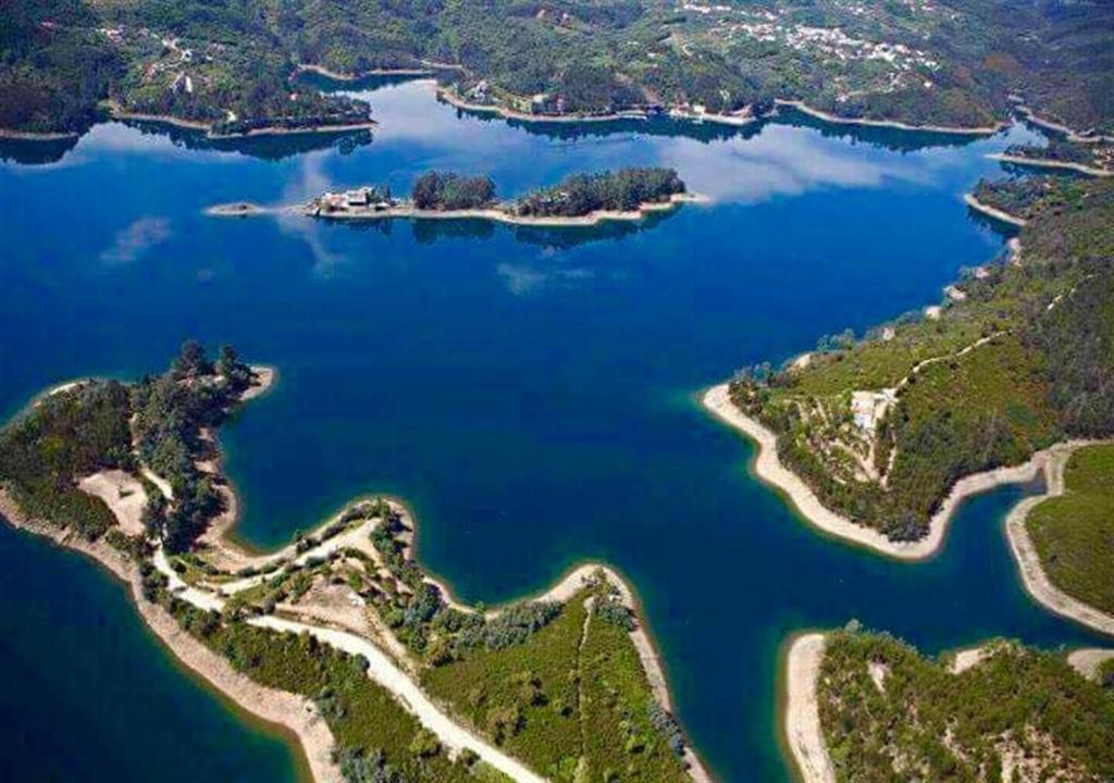 an aerial view of a large body of water at Casa da Lameira in Serra