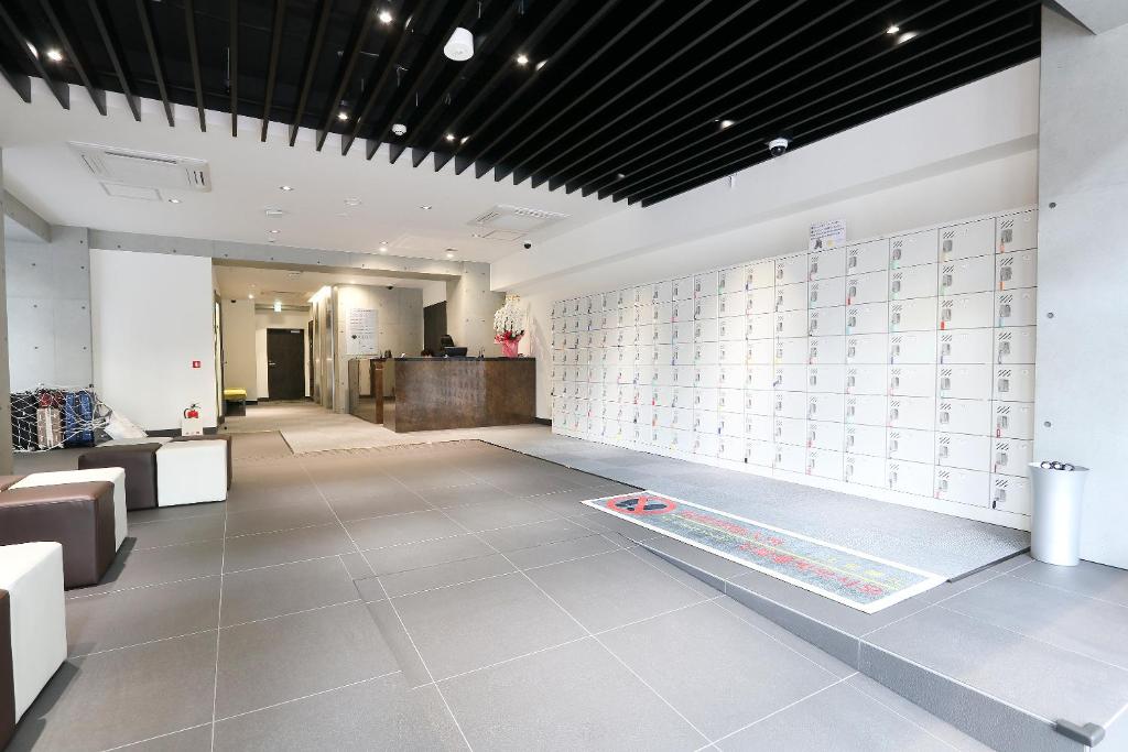 Vstupní hala nebo recepce v ubytování Business Capsule Hotel Lightning Hotel Asakusa