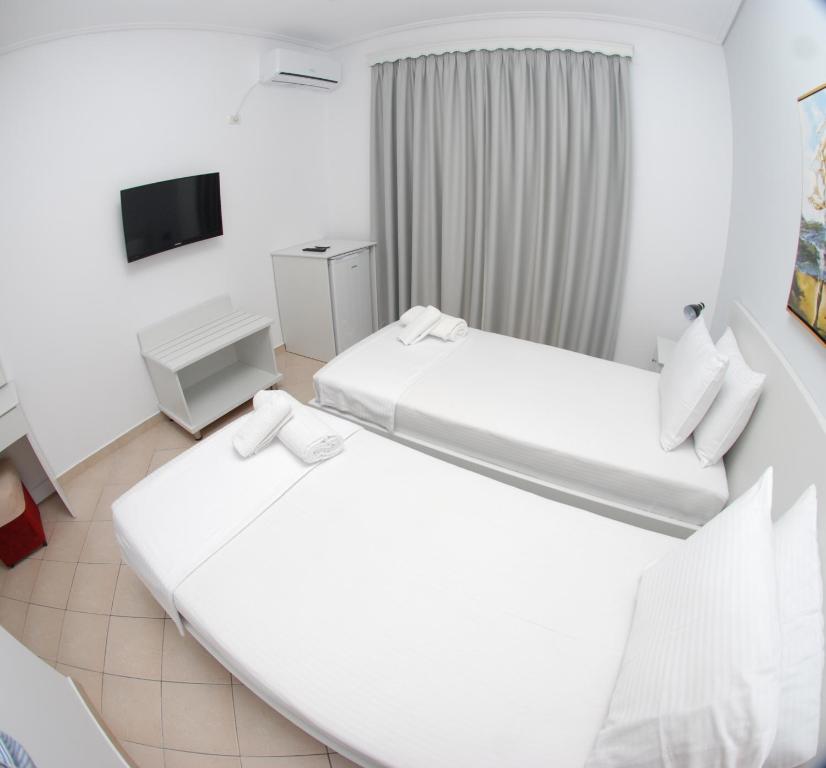 Postel nebo postele na pokoji v ubytování Hotel MS