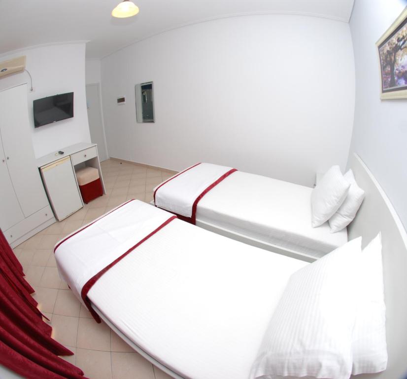 Postel nebo postele na pokoji v ubytování Hotel MS