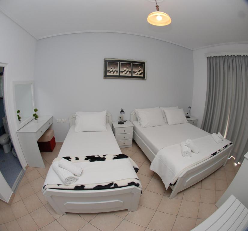 Postel nebo postele na pokoji v ubytování Hotel MS