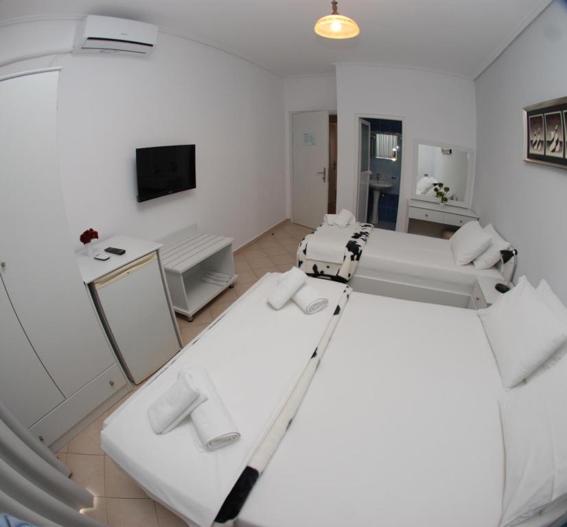 Postel nebo postele na pokoji v ubytování Hotel MS