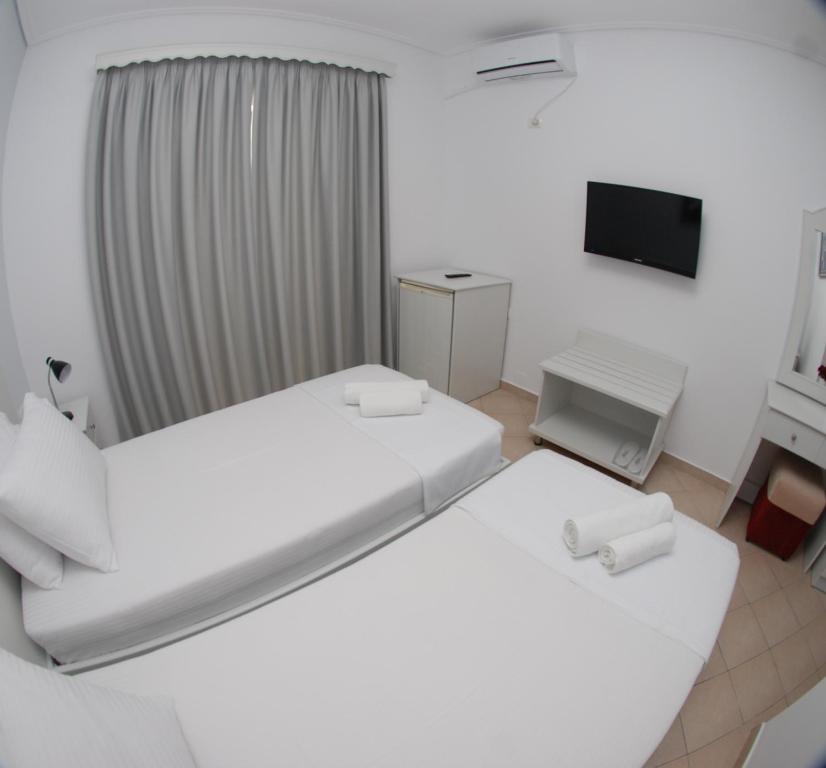 Postel nebo postele na pokoji v ubytování Hotel MS