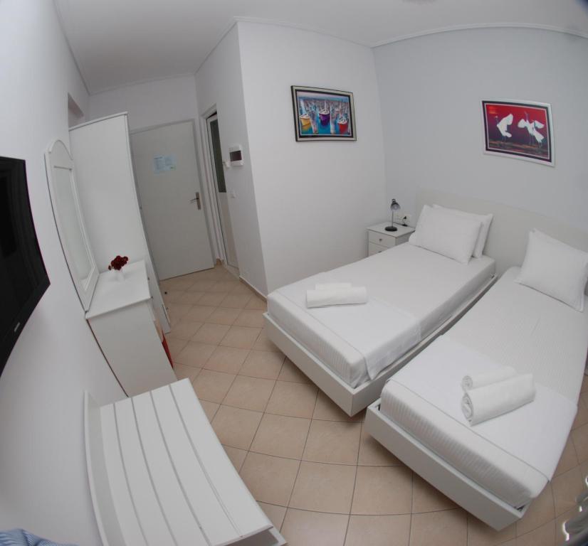 Postel nebo postele na pokoji v ubytování Hotel MS