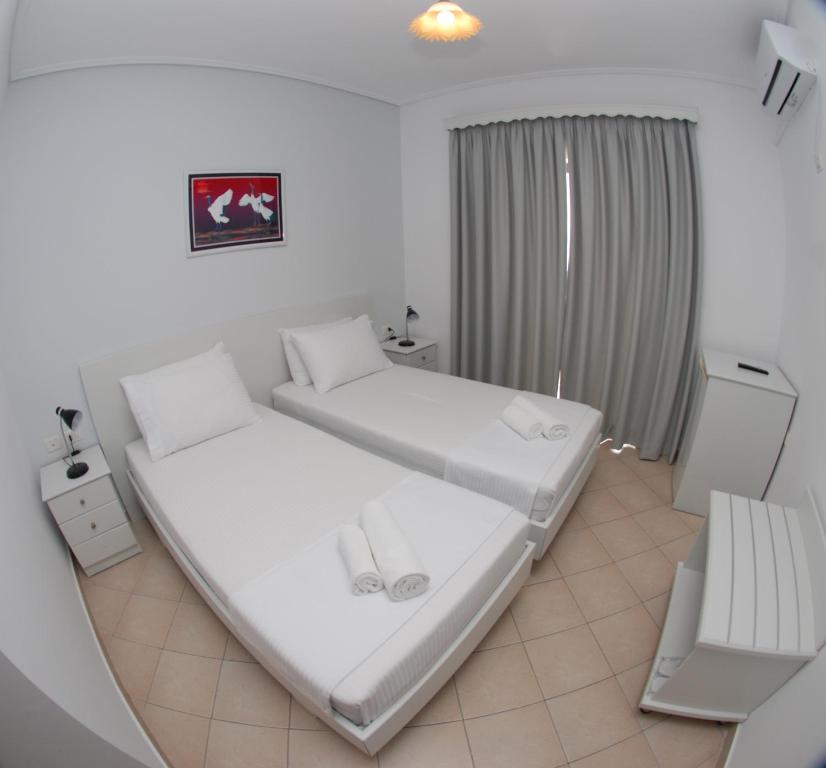 Postel nebo postele na pokoji v ubytování Hotel MS