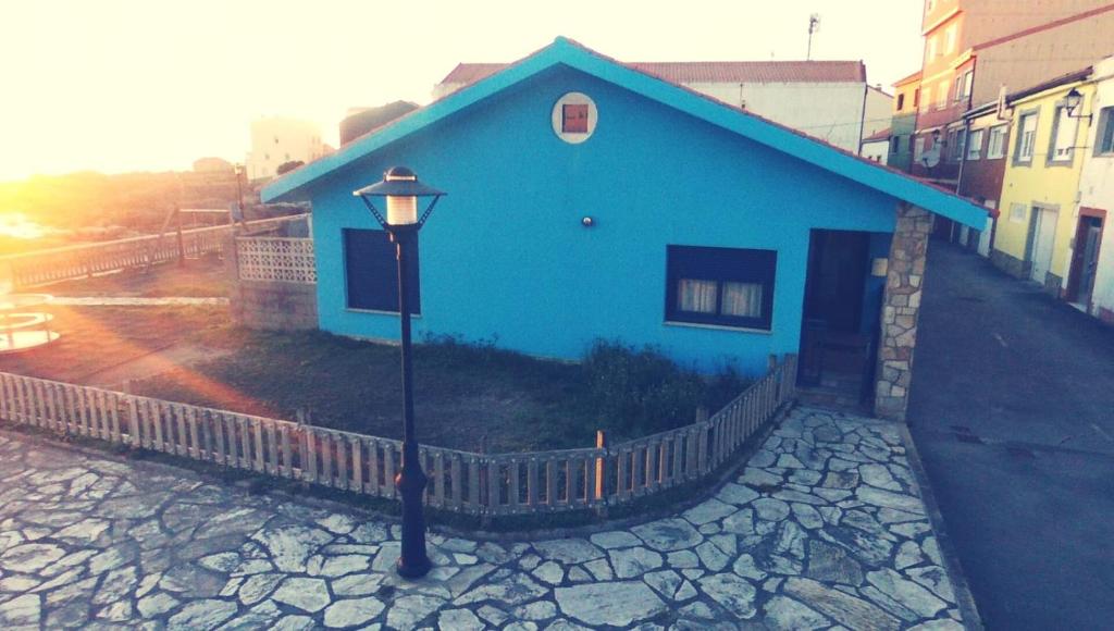 ムシアにあるCantos do Coidoの青い家