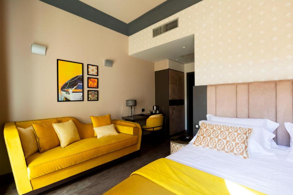 Postel nebo postele na pokoji v ubytování Amadomus Luxury Suites