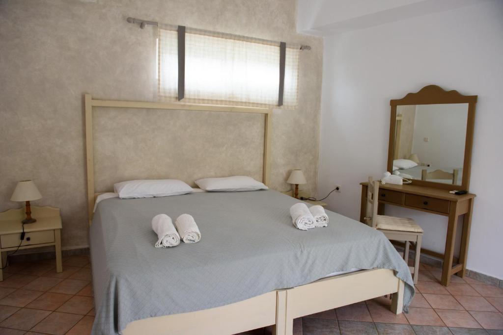 Postel nebo postele na pokoji v ubytování Paloma Luxury Studios