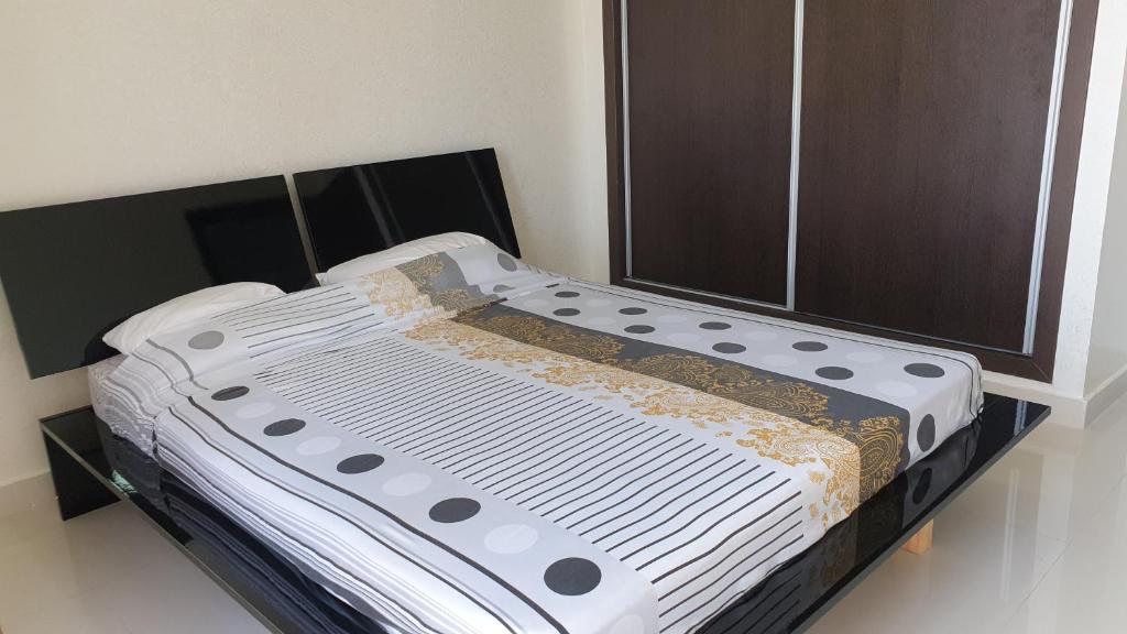 Postel nebo postele na pokoji v ubytování Riad Saidia