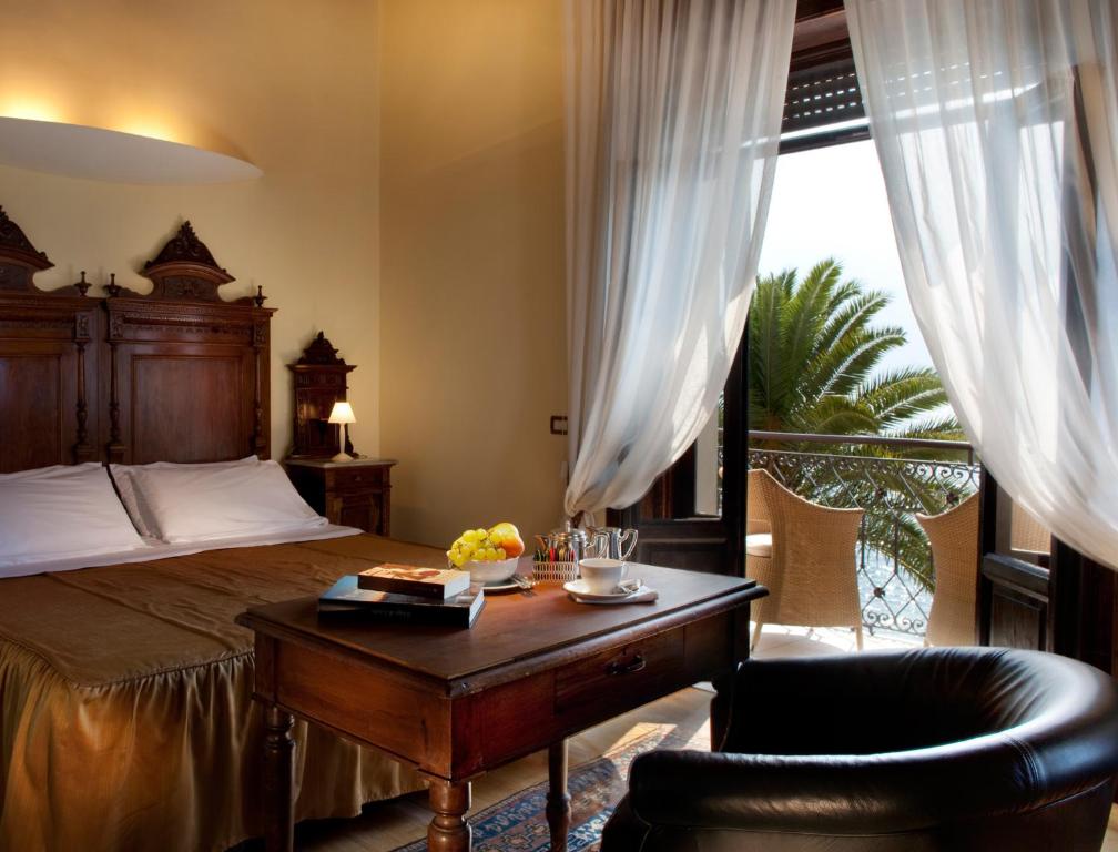 Postel nebo postele na pokoji v ubytování Hotel Villa Giulia