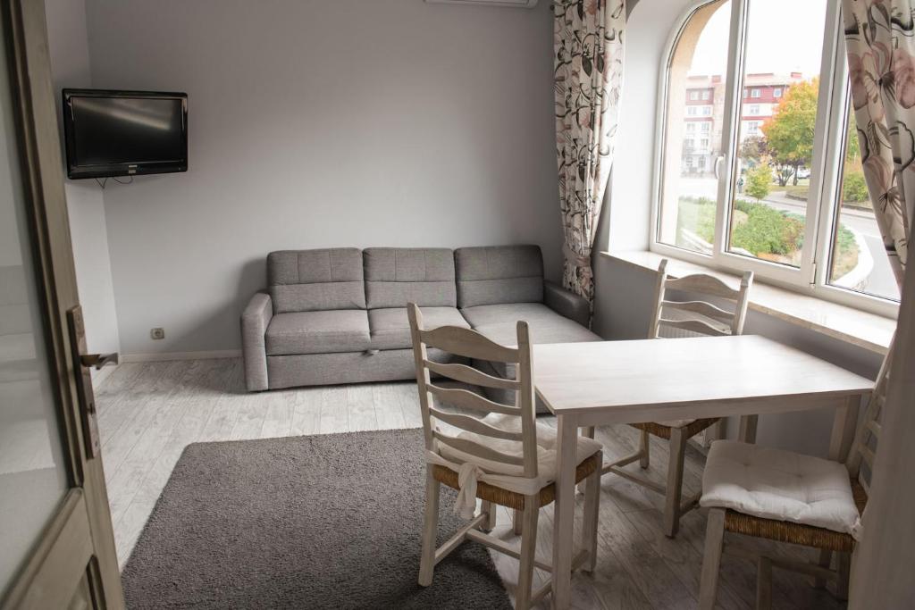 Posedenie v ubytovaní Apartamenty Faust