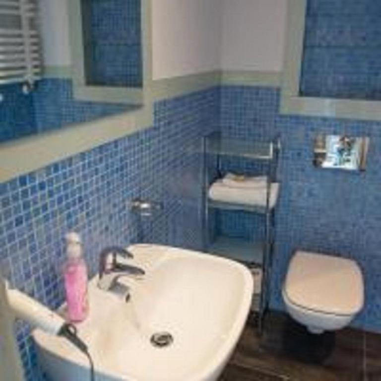 Kúpeľňa v ubytovaní Apartamenty Faust