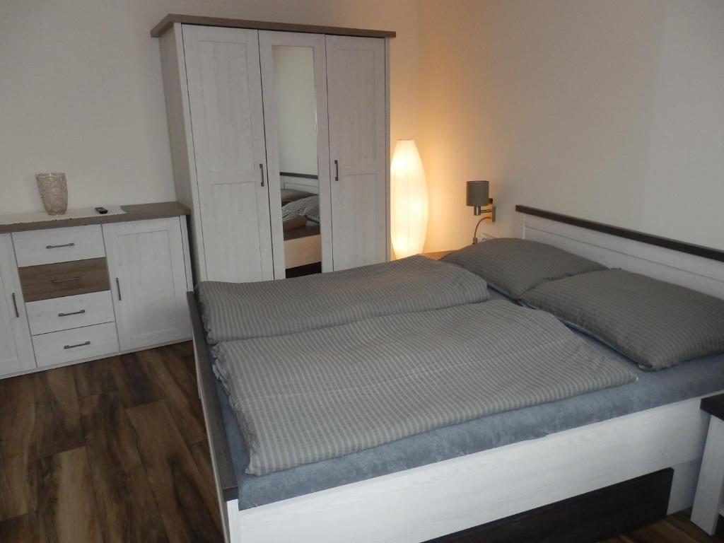 Postel nebo postele na pokoji v ubytování Apartmány 27