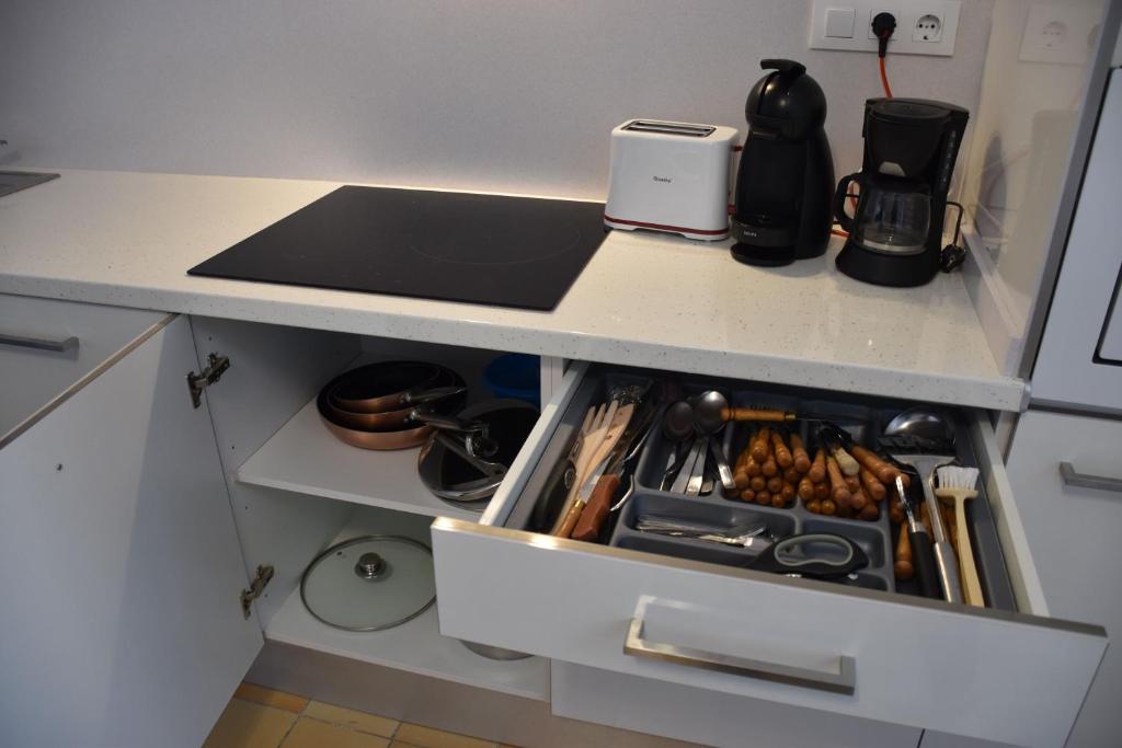 Kuchyň nebo kuchyňský kout v ubytování Rosesapparts A20deMar Triplex