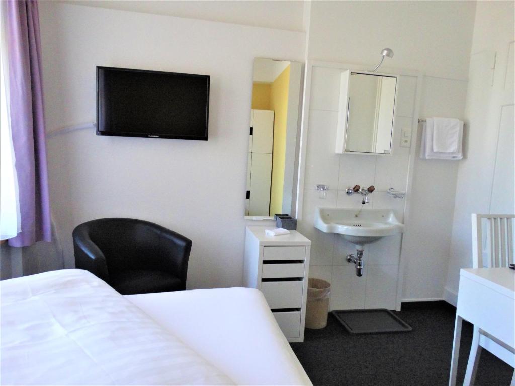 Koupelna v ubytování Hotel Bündnerhof