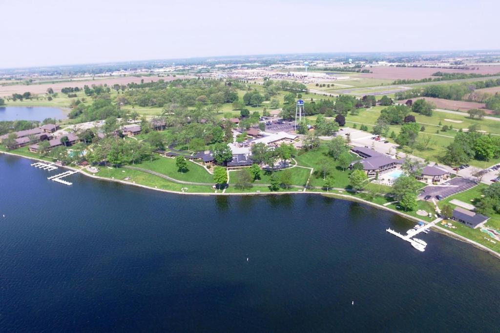 an island in the middle of a body of water at Lake Lawn Resort in Delavan