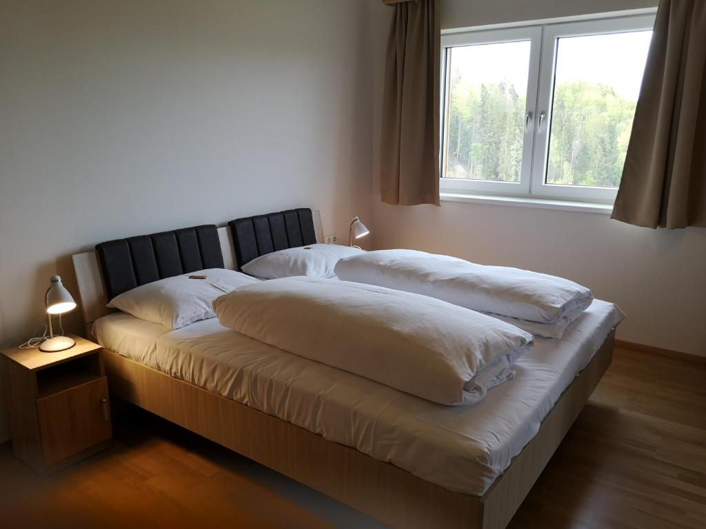 Postel nebo postele na pokoji v ubytování Hotel Restaurant Winterbach