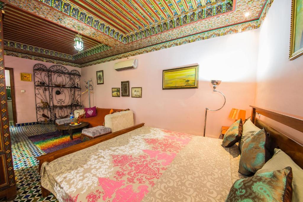 Postel nebo postele na pokoji v ubytování Riad L'Artiste