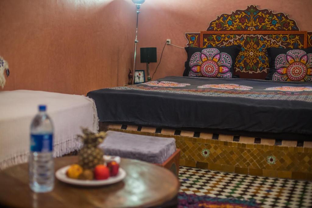 Postel nebo postele na pokoji v ubytování Riad L'Artiste