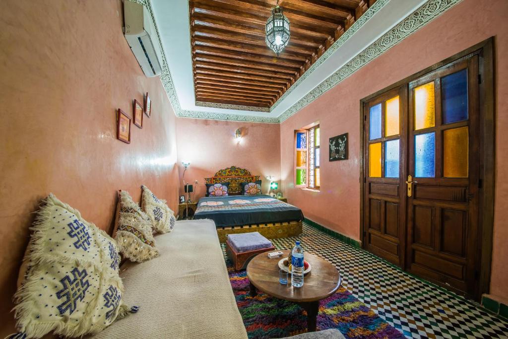 Postel nebo postele na pokoji v ubytování Riad L'Artiste