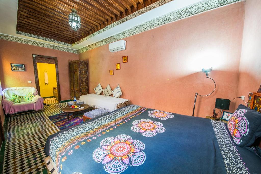 Postel nebo postele na pokoji v ubytování Riad L'Artiste