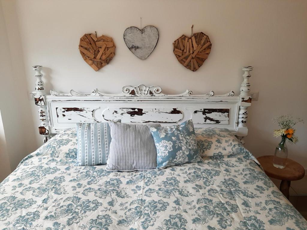 Letto o letti in una camera di B&B dei Laghi