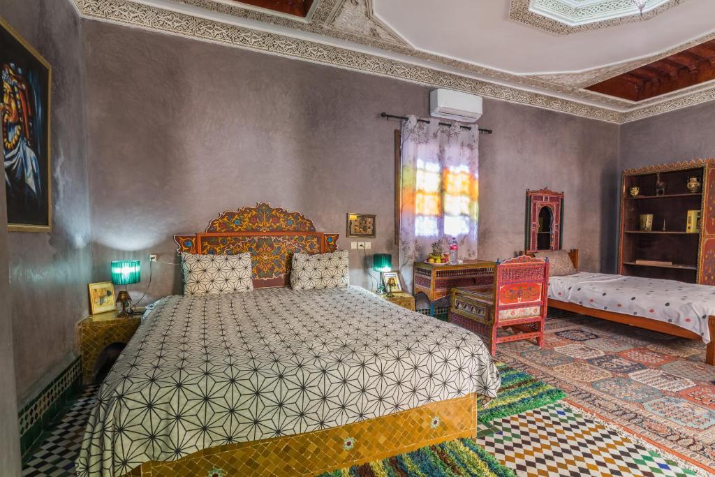 Postel nebo postele na pokoji v ubytování Riad L'Artiste
