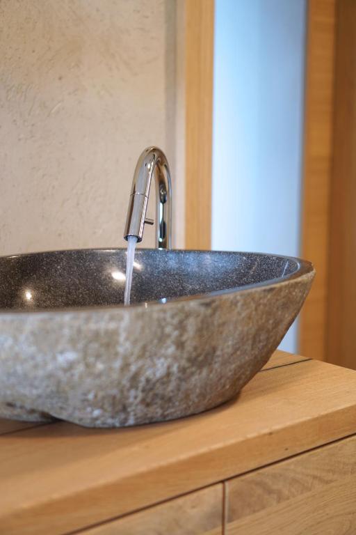 Foto sihtkohas Glanz an der Weinstraße asuva majutusasutuse Mahorko Wein Wellness Wasserbüffel galeriist