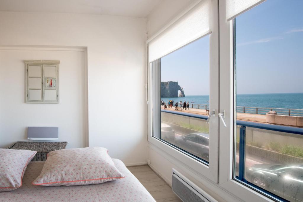 a room with a window with a view of the ocean at Sea View 2 room apartment 50M2 in Étretat