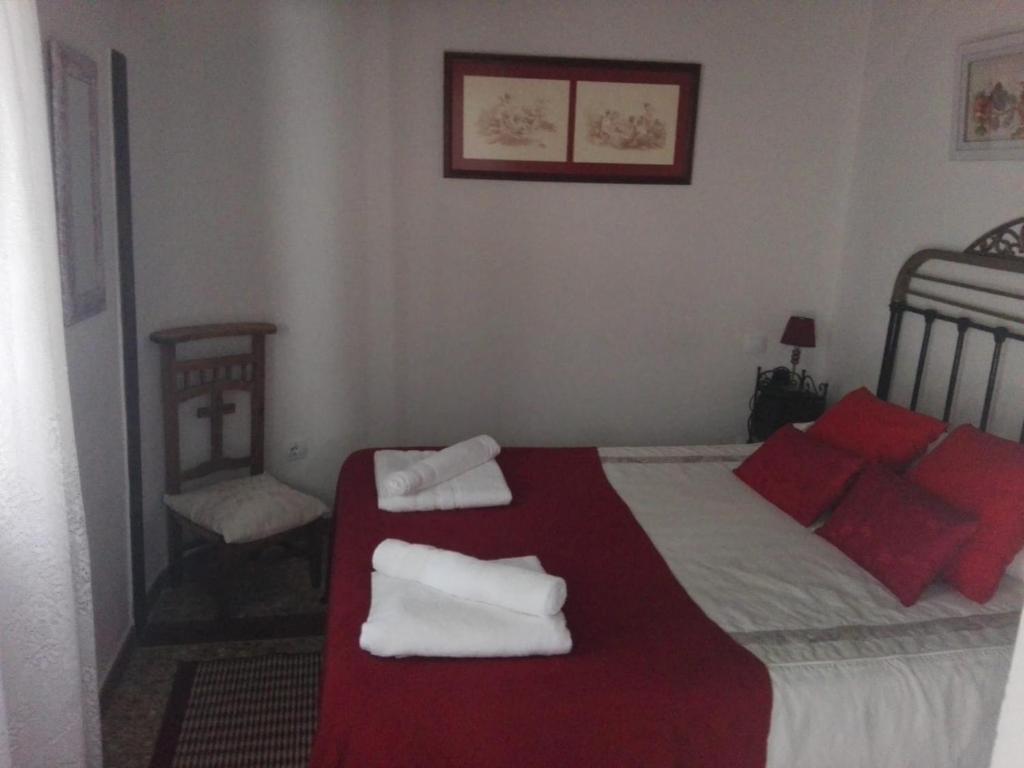 Postel nebo postele na pokoji v ubytování Casa rural El Rincón