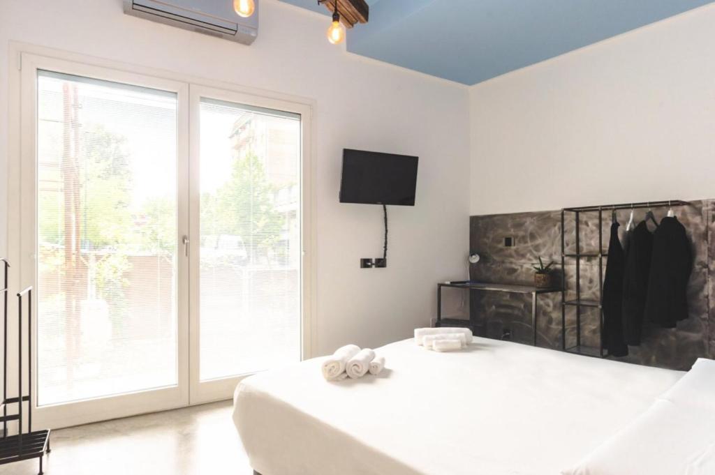 Postel nebo postele na pokoji v ubytování A CASA DI MARIANNA