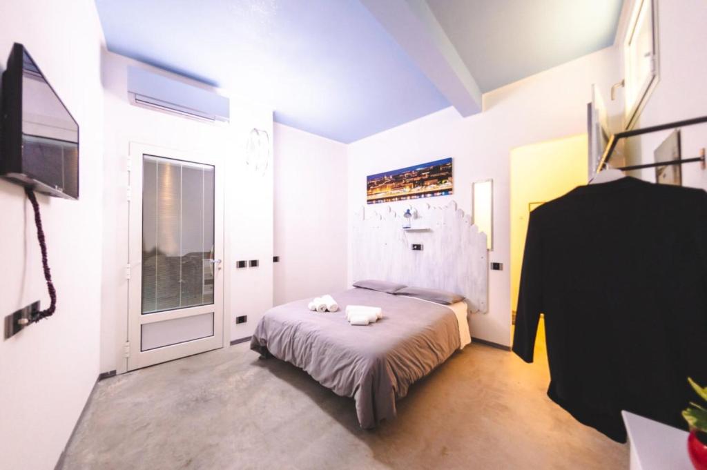 Postel nebo postele na pokoji v ubytování A CASA DI MARIANNA