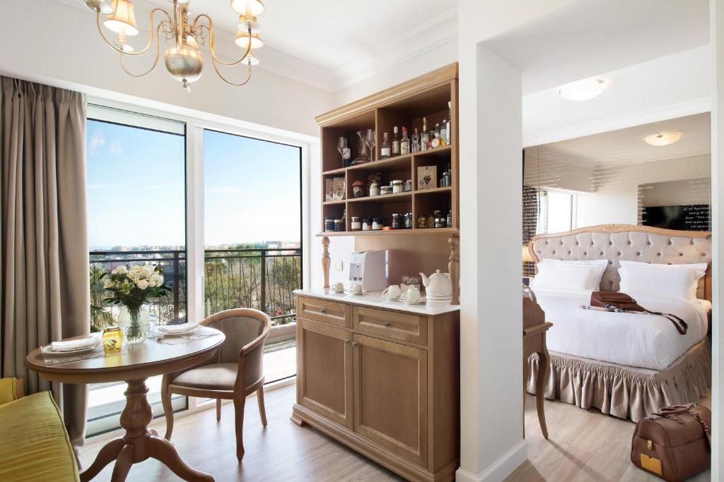 Posedenie v ubytovaní Legacy Gastro Suites