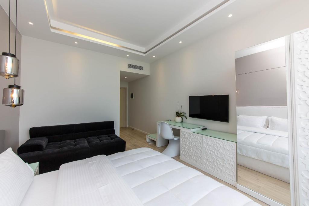 Кровать или кровати в номере Demi Hotel