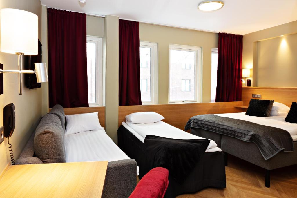 Postel nebo postele na pokoji v ubytování Best Western Hotel Arena