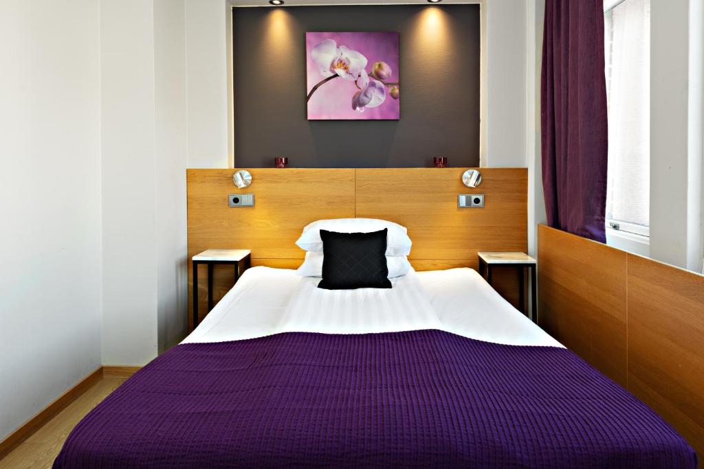 Postel nebo postele na pokoji v ubytování Best Western Hotel Arena