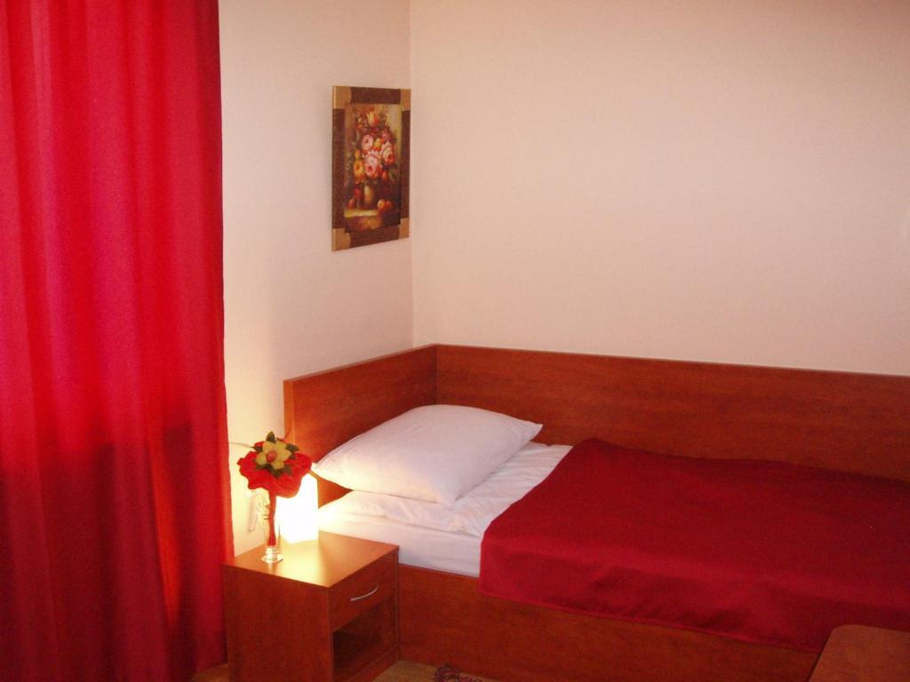 Postel nebo postele na pokoji v ubytování Hotel Jezero